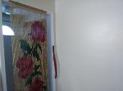 How to Add a Wooden Beaded Curtain
